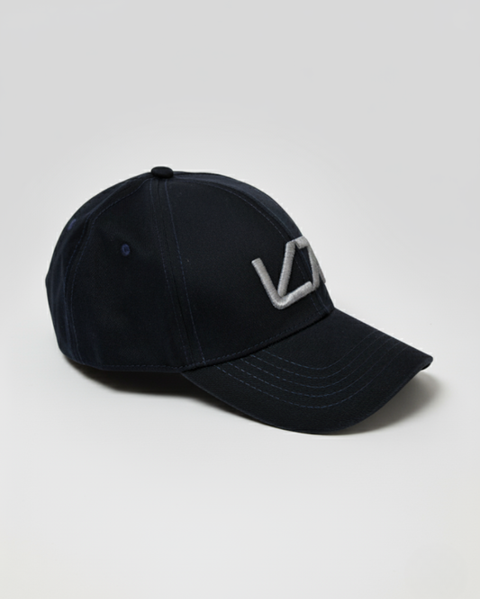 VYBE cap in Oceano – deep blue performance cap with minimalist VYBE logo